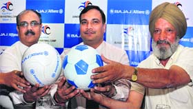 Jigar Singh, former football player (first from right), along with a representative of Bajaj Allianz during an interaction with the media in Jalandhar on Thursday.