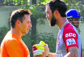 Are Glenn Maxwell of Kings XI and Brad Hodge of Rajasthan Royals shaking hands or testing each others strength on the eve of their enocunter in Mohali?
