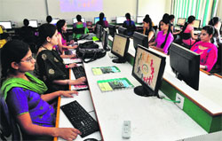 Students have a trial run at a laboratory set up for the postgraduate cyber crime course, to be introduced at the Government College for Girls in Chandigarh. Tribune photo: Parvesh Chauhan