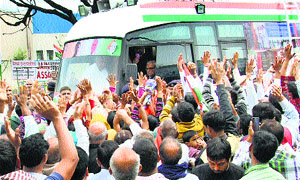 Chief Minister Hooda addresses an election rally at Rai, near Sonepat. 