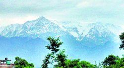 The Dhauladhar range experienced fresh snowfall on Friday