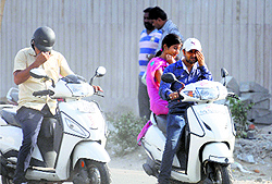 Commuters caught in a duststorm that hit Ludhiana on Friday