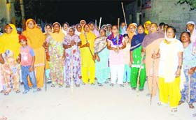 Women of Bilaspur village in Moga district on a night patrol to stop drug smugglers from entering their village.