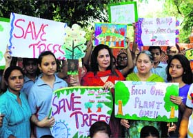 CPS Dr Navjot Kaur Sidhu along with schoolchildren during a protest against the felling of trees in Amritsar on Saturday