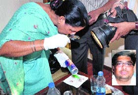 Cops examine the hotel room where Vishal Sharma (inset) committed suidide in Jalandhar on Saturday.