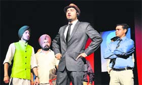 Artistes enact a scene during the play 'Jitthe Kavita Khatam Hundi Hai' at the Desh Bhagat Yadgaar hall in Jalandhar.