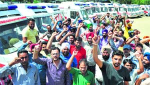 Striking employees in Patiala on Saturday.