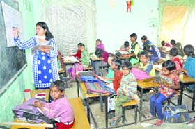 Chandrika Kaura with her students at in Karnal.