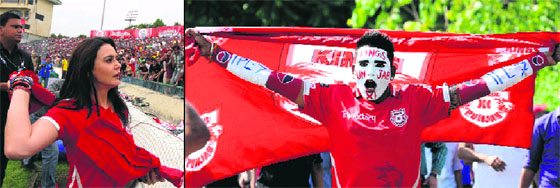 Co-owner of Kings XI Punjab Preity Zinta throws team T-shirts at the crowd; and a fan of Kings XI Punjab cheers his team during an IPL T20 match against Delhi Daredevils at PCA Stadium in Mohali on Sunday. The Kings XI Punjab beat Delhi Daredevils by seven wickets.