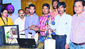 Students with the semi-automatic rescue robot that they developed at the Sri Sukhmani Institute of Engineering and Technology, Dera Bassi. 