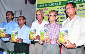 Dignitaries release Rajindra Baloodis poetry book during a programme at the Survey Community Centre in Dehradun on Sunday