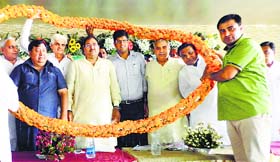 INLD leaders Abhay Chautala (third from left) and Dushyant Chautala (fourth from left) at a party meeting in Kaithal on Sunday