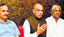 Prem Kumar Dhumal, former Chief Minister, addresses mediapersons in Una on Sunday