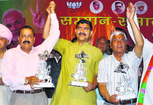 (From left) MP Udhampur-Doda Jitendra Singh, MP Jammu-Poonch Jugal Kishore Sharma and MP Ladakh Thuptsan Chhewang during a felicitation function in Jammu on Sunday