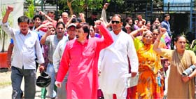 Members of the Keshar Jan Kalyan Samiti protest against inadequate water supply in Dehradun on Monday.