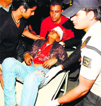 An injured person being rushed to the IGMC in Shimla on Monday evening.