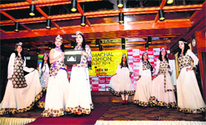 Girls catwalk on the ramp during the Himachal Fashion Hunt-2013 organised by INIFD, Hamirpur, in Shimla on Monday.