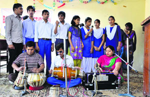 Visually impaired students present a group song at the Vocational Rehabilitation Training Centre on Haibowal Road in Ludhiana on Monday.