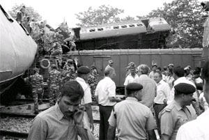 Rescue work in progress after Gorakhpur-bound Gorakhdham Express rammed into a goods train at the Chureb station in Basti on Monday.