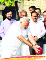 Narendra Modi pays floral tributes to Mahatma Gandhi at Rajghat on Monday
