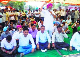 In unison: Industrialists protest PSPCLs decision to change supply feeder in Dhuri on Monday
