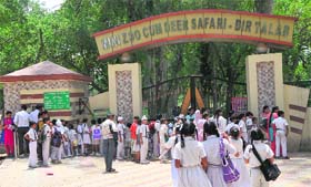 Schoolchildren outside the gate of the Mini Zoo-cum-Deer Safari