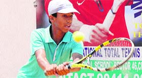 A player returns a shot during a match at the Kundan Tennis Academy, Sector 46, Chandigarh.