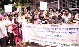 RELIGIOUS ANGER: Sikh community members hold a protest at the District Magistrate office in Dehradun on Tuesday
