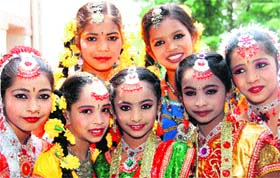 Glorious innocence: Girls from Maharashtra wait for their performance during the All-India Dance and Theatre Festival underway in Dehradun on Tuesday