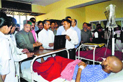 Chief Minister Virbhadra Singh meets Theog bus mishap victims at the IGMC Hospital in Shimla on Tuesday.