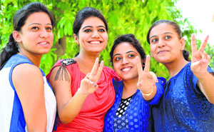 (Left to right) Pooja Duggal (rank 3), Aanchal Gaba (1), Priyanka (5) and Prachi (8) of the Devki Devi Jain Memorial College for Women in a jubilant mood after the declaration of results.