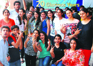 Students of Bhavan Vidyalaya are all smiles after the Class XII results were declared in Panchkula. 