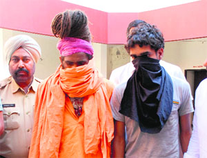The accused in police custody at the Sector 14 police station in Panchkula on Wednesday