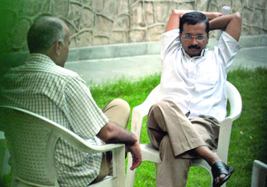 Former Chief Minister Arvind Kejriwal and AAP party leader Manish Sisodia after a meeting of MLAs at his residence in New Delhi on Wednesday.