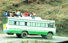 An overcrowded HRTC bus on the Shimla-Chella road