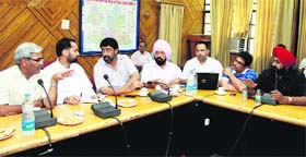 Secretary of the Local Bodies Department Ashok Gupta, CPS Pawan Tinu and Mayor Sunil Jyoti, during a meeting on property tax in Jalandhar on Wednesday