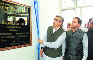 Chief Minister Omar Abdullah along with Power Minister Vikar Rasool inaugurates the Data-cum- Customer Care Centre of the Power Development Department at Bemina in Srinagar on Wednesday. 