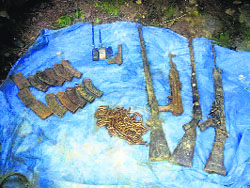 Arms and ammunition recovered by security forces from the Gandho area of Doda on Wednesday.