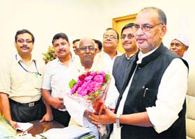 Radha Mohan Singh takes charge as Union Minister for Agriculture at his office in New Delhi on Wednesday