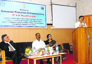 DC Rakesh Kanwar addresses participants during a seminar on consumer protection and empowerment in Kullu on Thursday.
