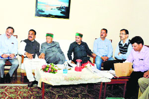 Chief Minister Virbhadra Singh presides over a meeting at Rohru in Shimla district on Thursday.