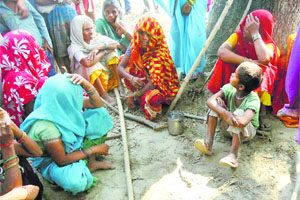 The victims relatives at Katra village in Badaun district, Uttar Pradesh.