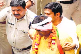 BJP Kisan Morcha president Om Prakash Dhankar is taken into custody