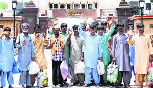 Pakistani prisioners before crossing over to Pakistan at the Wagah check post on Friday.