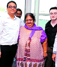 Dr Ashish Vashishtha with patient Kiran after surgery during a press conference in Bathinda on Saturday