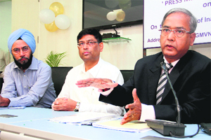 UK Sinha, Chairman of Securities and Exchange Board of India, addresses mediapersons in Dehradun on Saturday.
