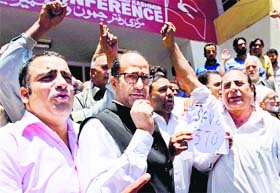 NC workers protest against the statement of Jitender Singh, Minister of State in the PMO, on the abrogation of Article 370, in Srinagar