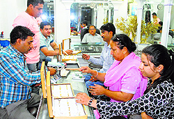 Residents purchase gold jewellery at Guru Bazaar Market in Amritsar