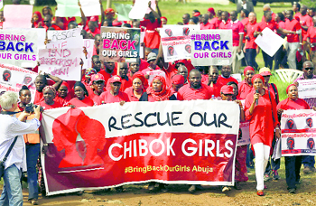 The Abuja wing of the "Bring Back Our Girls" protest group marches to deliver a protest letter to Nigeria's President Goodluck Jonathan calling for the release of the Nigerian schoolgirls kidnapped by militant group Boko Haram