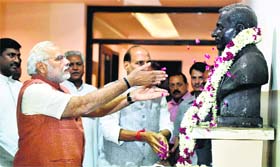 Prime Minister Narendra Modi and Home Minister Rajnath Singh pay tributes to Deen Dayal Upadhyaya in New Delhi on Sunday